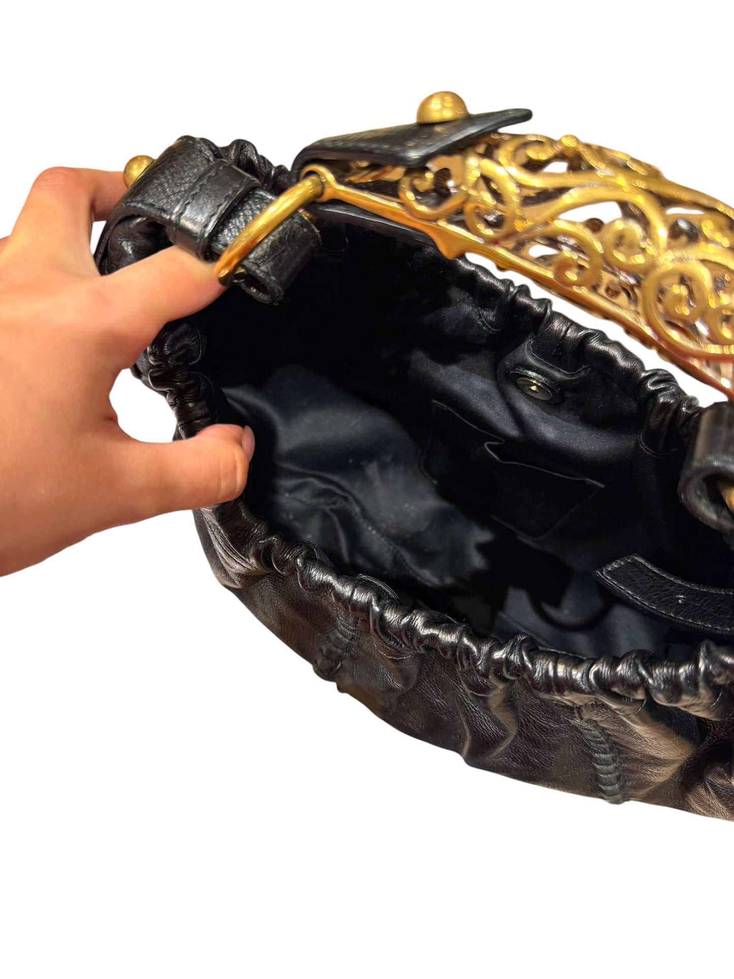 Yves Saint Laurent black Mombasa hobo bag with ornate gold metal handle