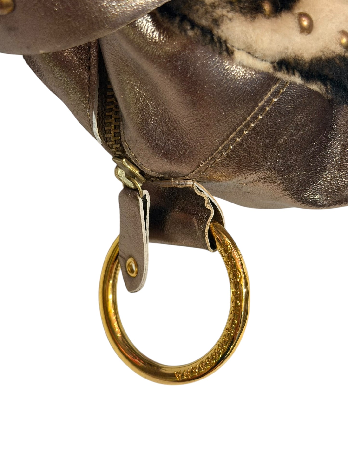 Dolce & Gabbana faux fur cow print bag with metallic straps