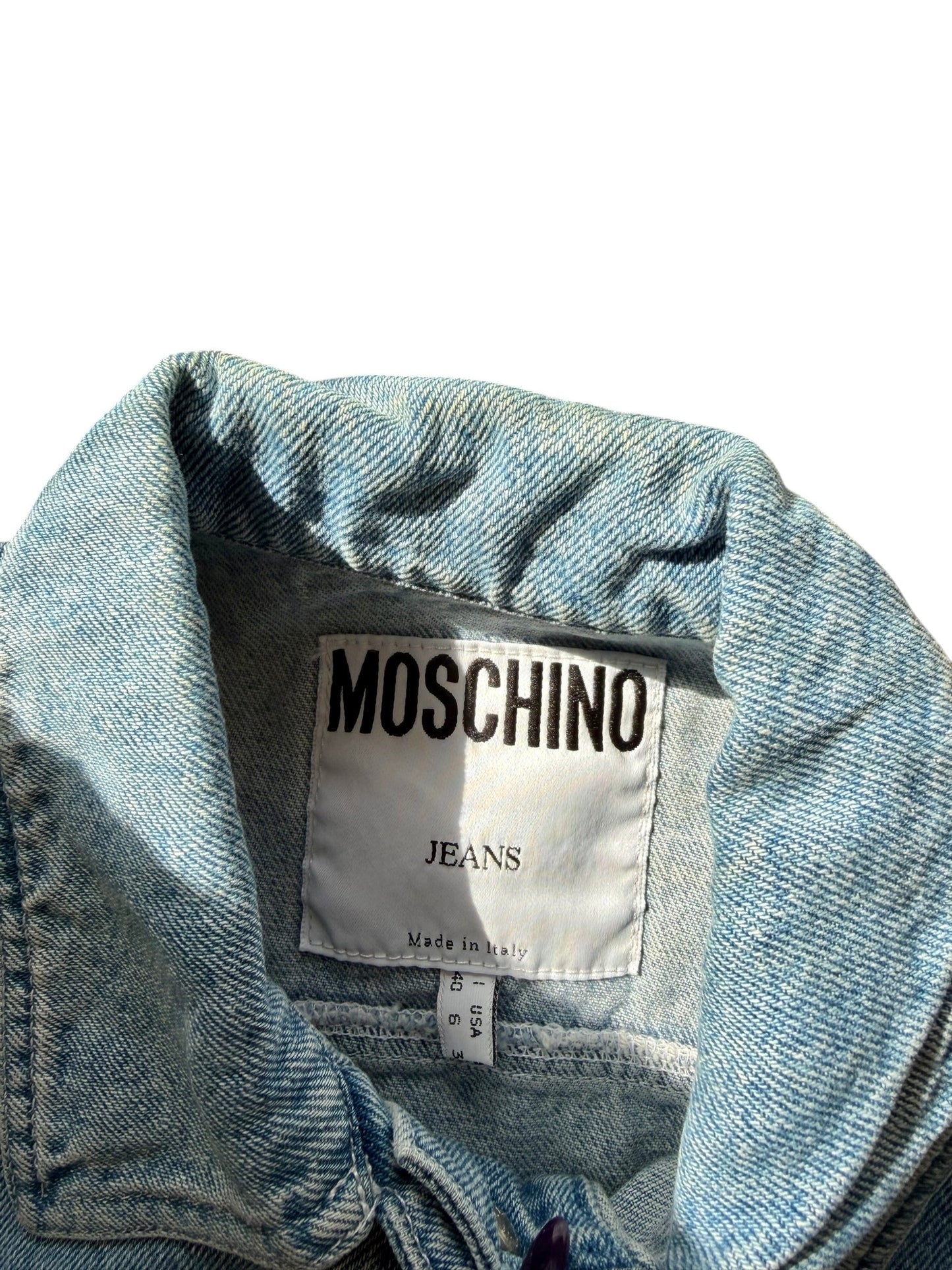 Moschino denim vest with white lace up details