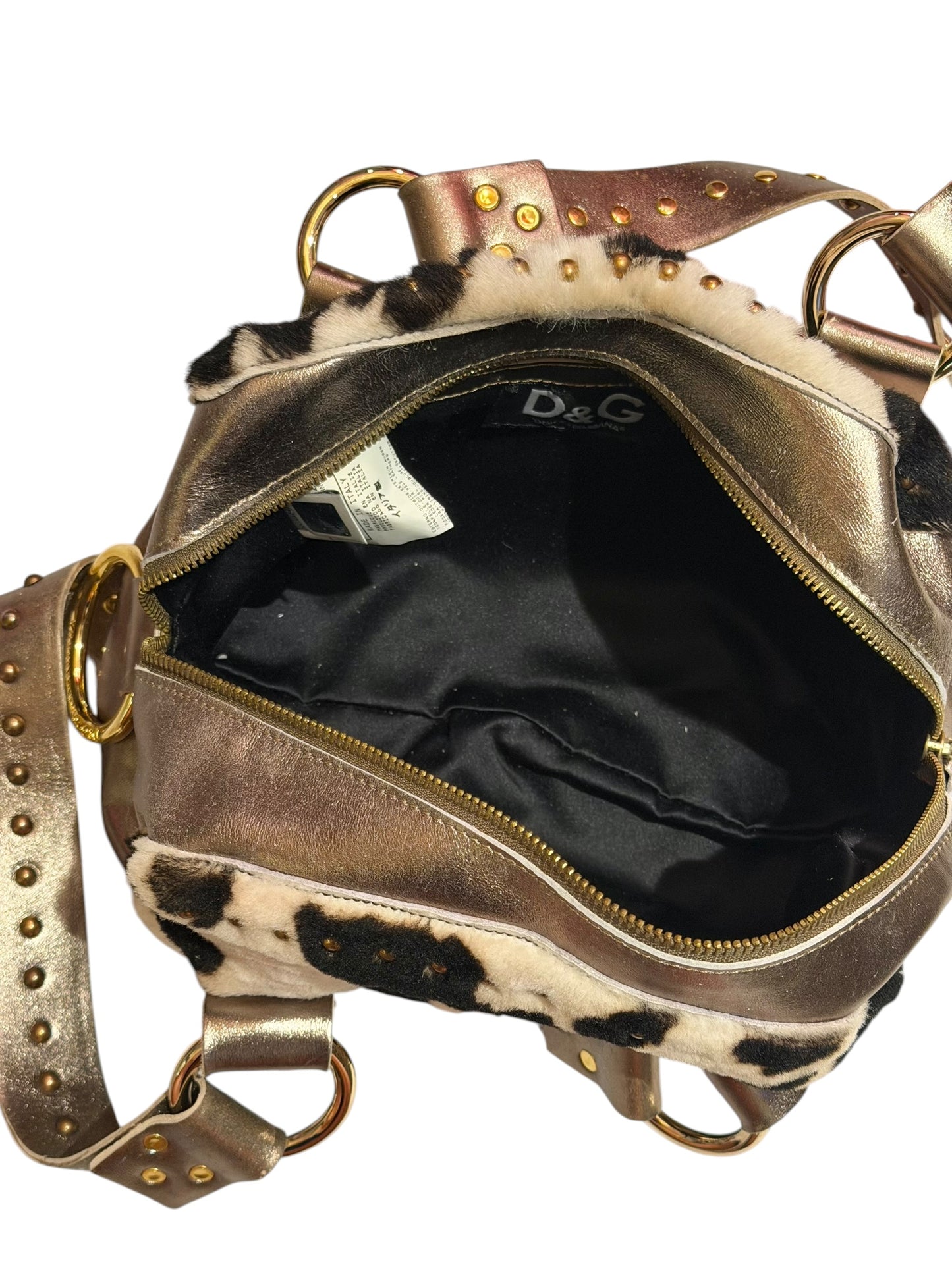 Dolce & Gabbana faux fur cow print bag with metallic straps